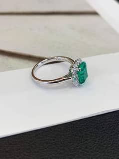 Emerald ring with diamonds