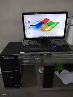 PC along with LCD and mouse and keyboard board