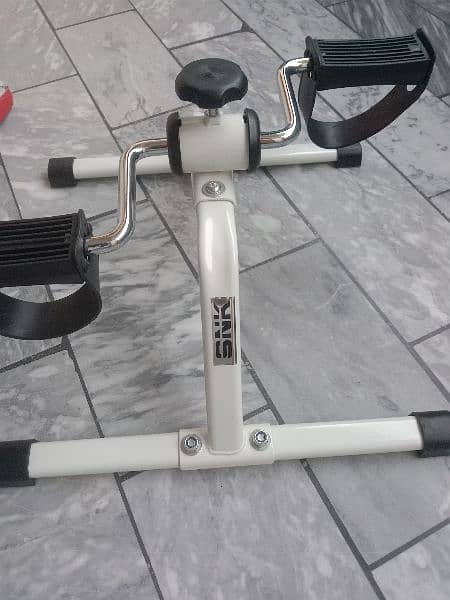 Pedal exerciser and twister plate 1