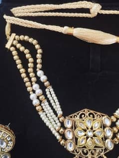 Beautiful pearl strings and kundun replica