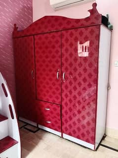 Red Wardrobe made up of Acrylic sheet with glass upper cover