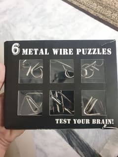 Metal wire puzzles. Test your brain.