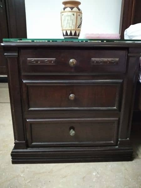 wooden bed with side table and mattress 1