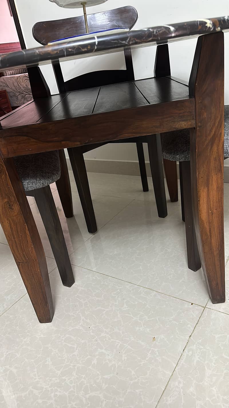 Wooden dinning table with four chairs 1