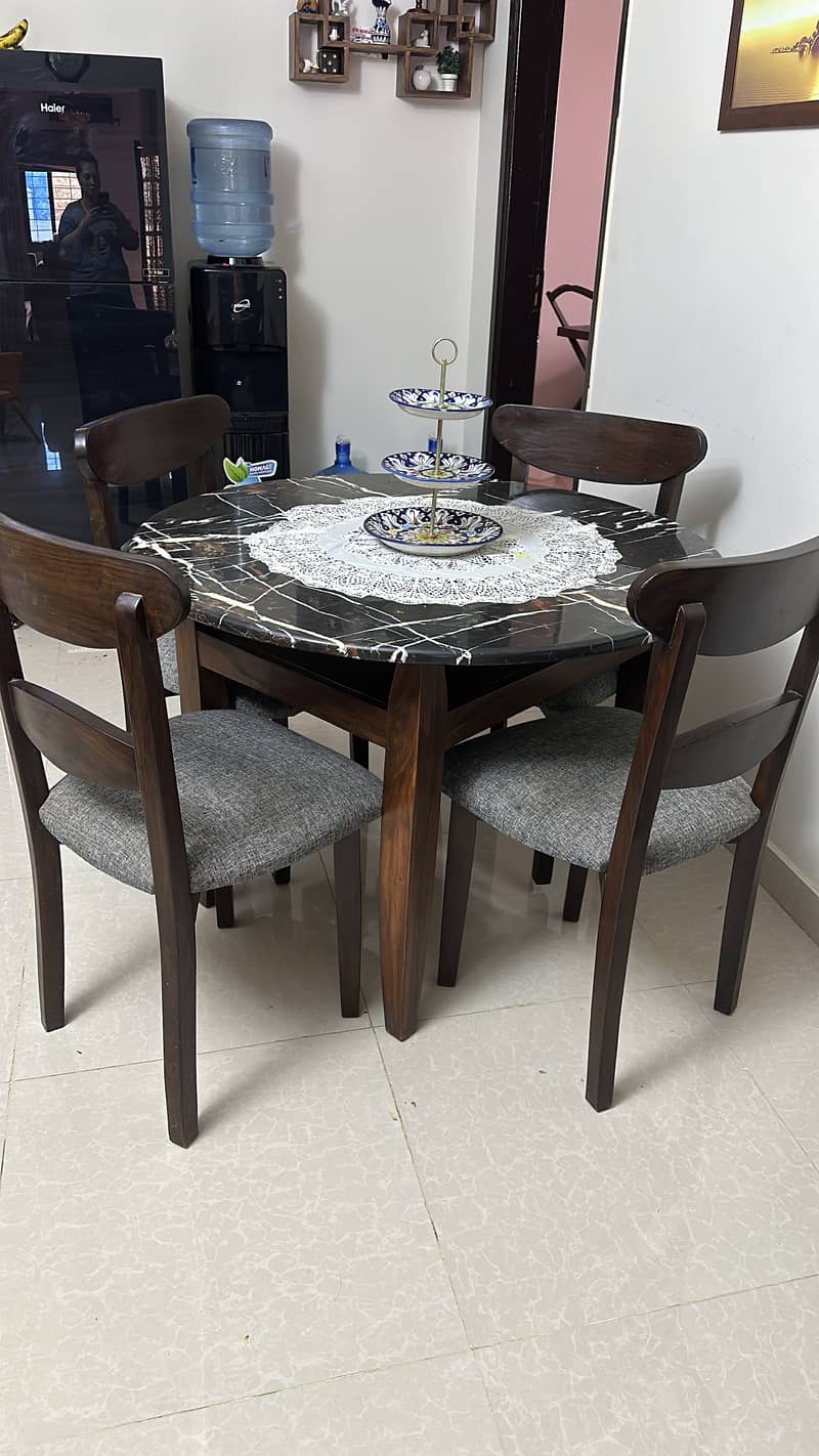 Wooden dinning table with four chairs 2