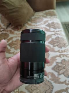 Sony 55-210mm E-mount lens with tripod