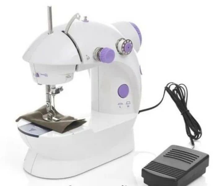 Urgent sale Mini sewing machine 1