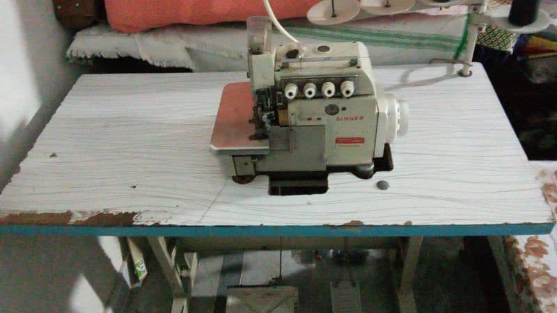 five thread slaie machine 3