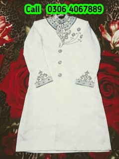 Prince new sherwani graceful design of white color Branded suit j