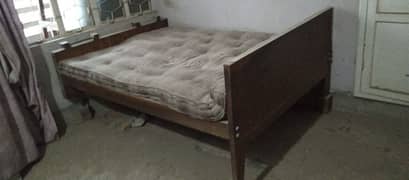 wooden double bed