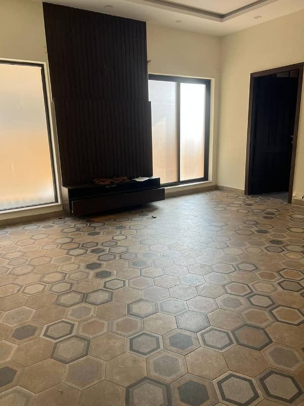 One kanal slightly used modern bungalow available on rent at DHA phase 06 34