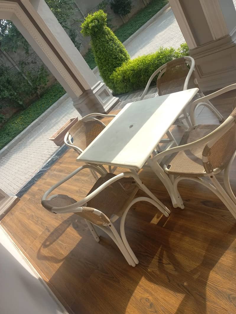 Outdoor garden chairs and table set. 1