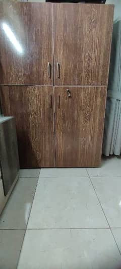 2 similar wooden cupboards (cabinets in each portion) 0