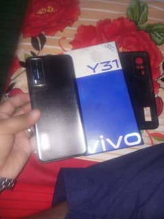 vivo y31 4 \128 ram  with charger and box condition 10 by 10