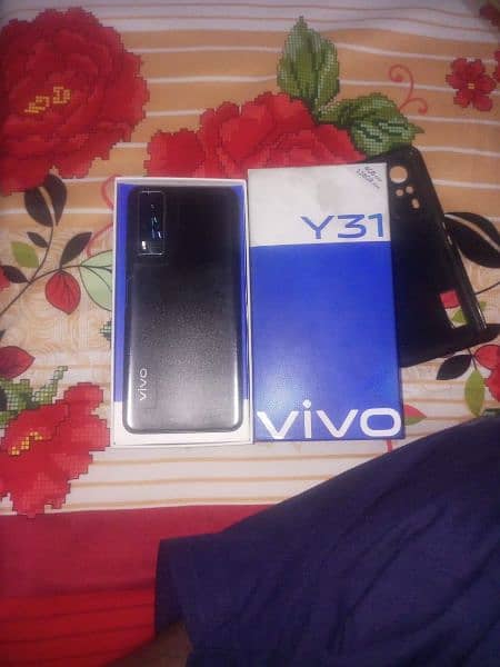 vivo y31 4 \128 ram  with charger and box condition 10 by 10 1