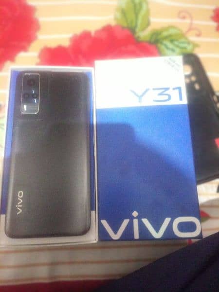 vivo y31 4 \128 ram  with charger and box condition 10 by 10 2