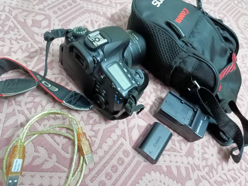 Canon 60d camera with badly and accessories 9