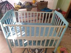 Baby cot with double shelf and tyres