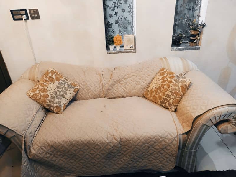 6 seater, off white and dull gold sofa. 3