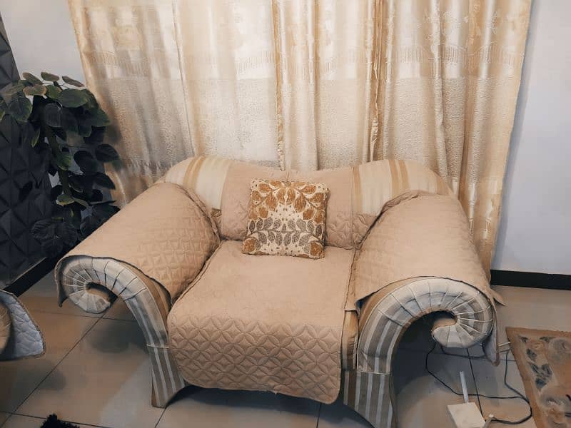 6 seater, off white and dull gold sofa. 5