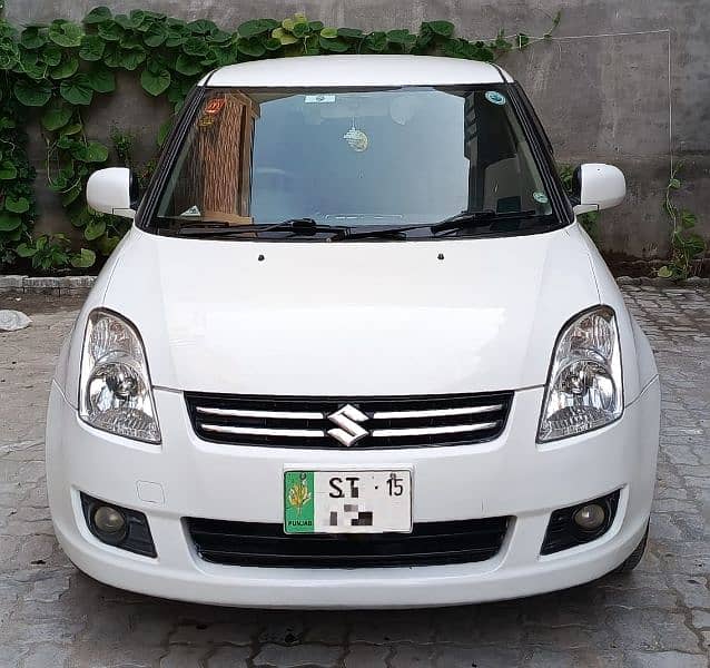 Suzuki Swift 2015 white colour neat and clean 1