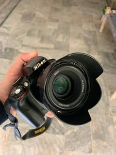 DSLR camera with 50mm lens 1.8