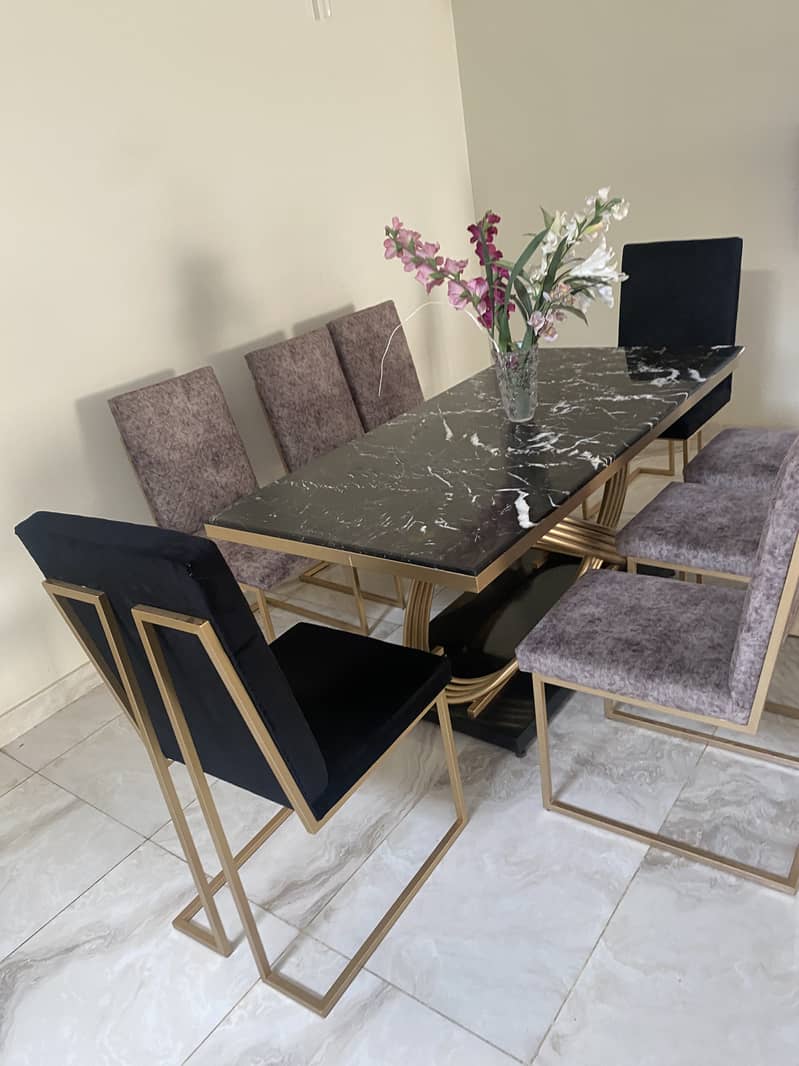 Marble dining table with 8 dining chairs. 1