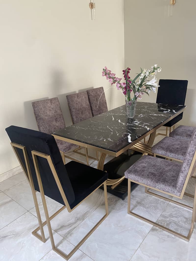 Marble dining table with 8 dining chairs. 4