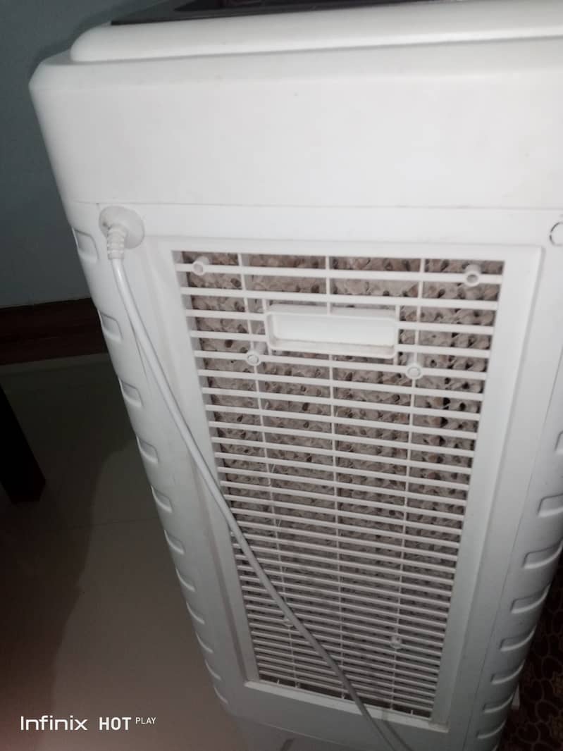 25 days used Air cooler 10/10 condition with 1 year warranty and slip 1