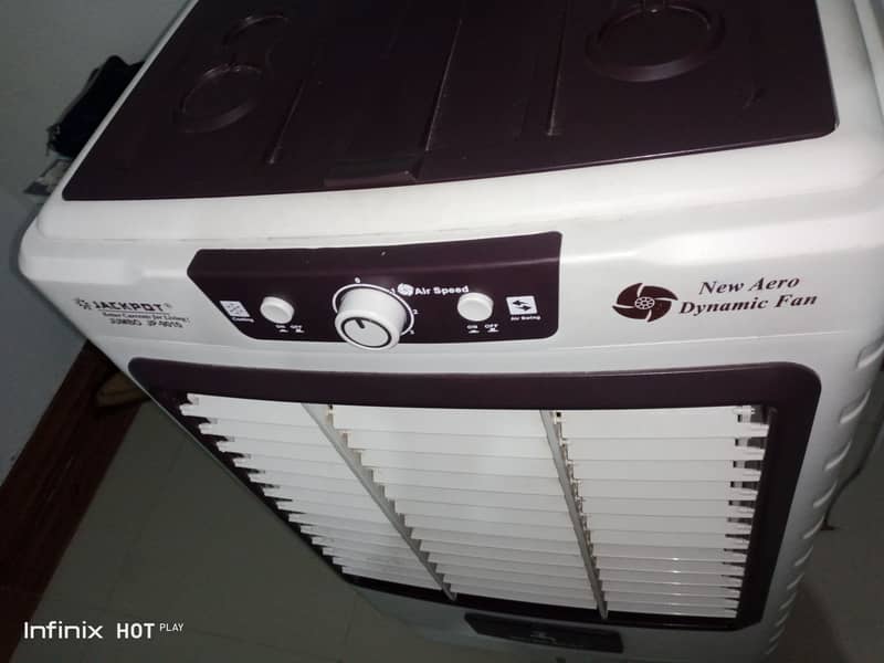 25 days used Air cooler 10/10 condition with 1 year warranty and slip 2