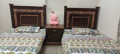 2 Single Beds With 1 Side table