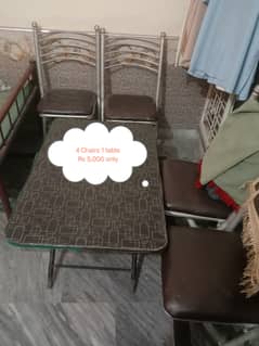 1 table with 4 Chairs for sale