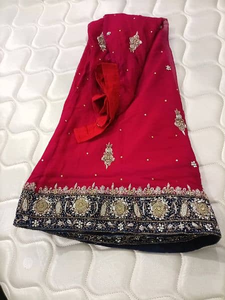 Beautiful Red Bridal Wear With Blue Touch Of Designing 3