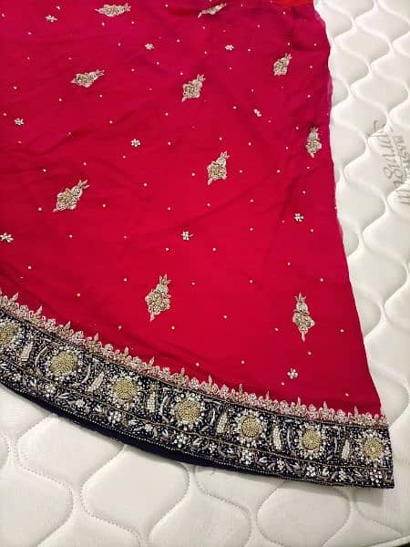 Beautiful Red Bridal Wear With Blue Touch Of Designing 4