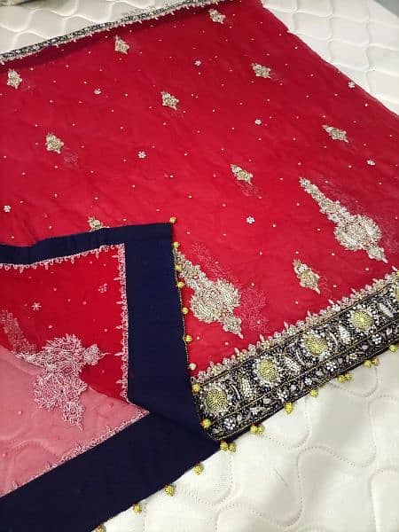 Beautiful Red Bridal Wear With Blue Touch Of Designing 10