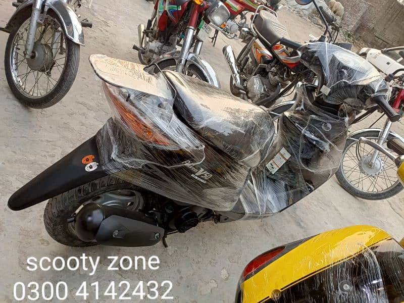 Electric scooty#49cc scooties available contact#0300 4142432# 5