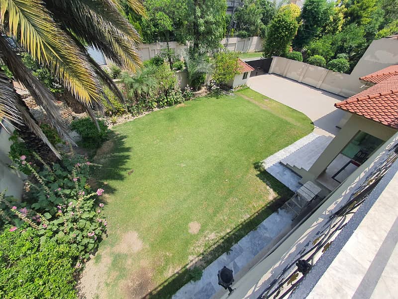 2 Kanal Fresh Renovated Well Maintained Independent Bungalow Lush Green Huge Lawn Near DHA Cinema 5