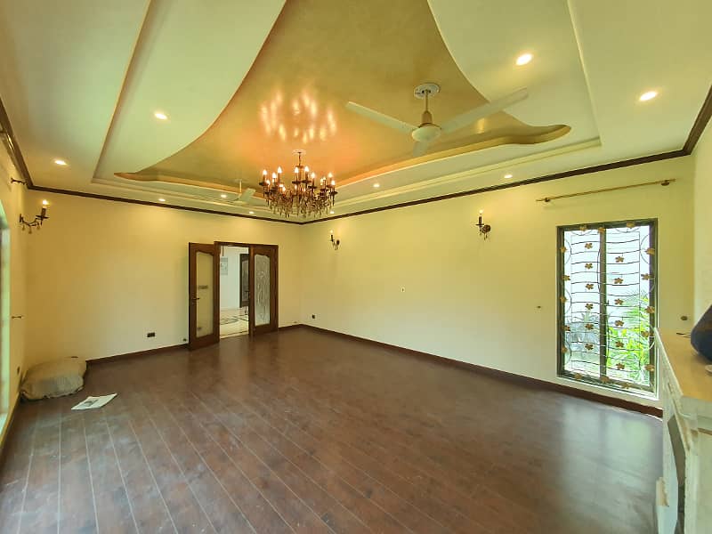 2 Kanal Fresh Renovated Well Maintained Independent Bungalow Lush Green Huge Lawn Near DHA Cinema 12