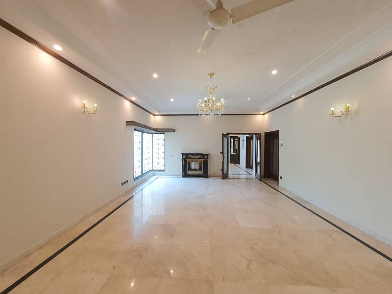 2 Kanal Fresh Renovated Well Maintained Independent Bungalow Lush Green Huge Lawn Near DHA Cinema 17