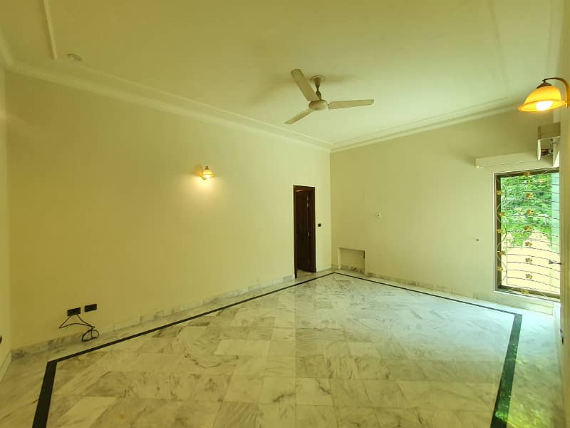 2 Kanal Fresh Renovated Well Maintained Independent Bungalow Lush Green Huge Lawn Near DHA Cinema 21