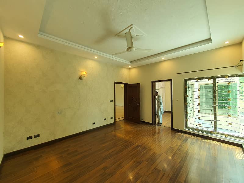 2 Kanal Fresh Renovated Well Maintained Independent Bungalow Lush Green Huge Lawn Near DHA Cinema 24