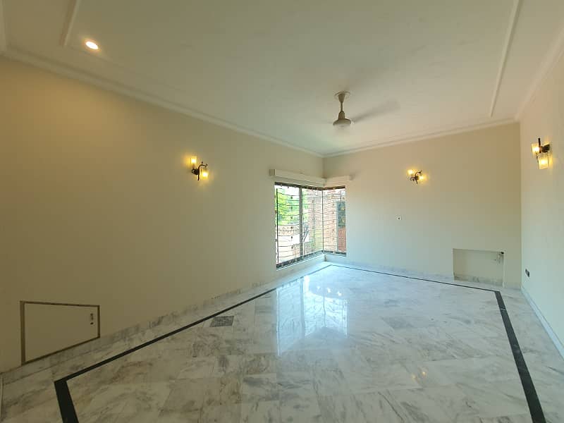 2 Kanal Fresh Renovated Well Maintained Independent Bungalow Lush Green Huge Lawn Near DHA Cinema 36