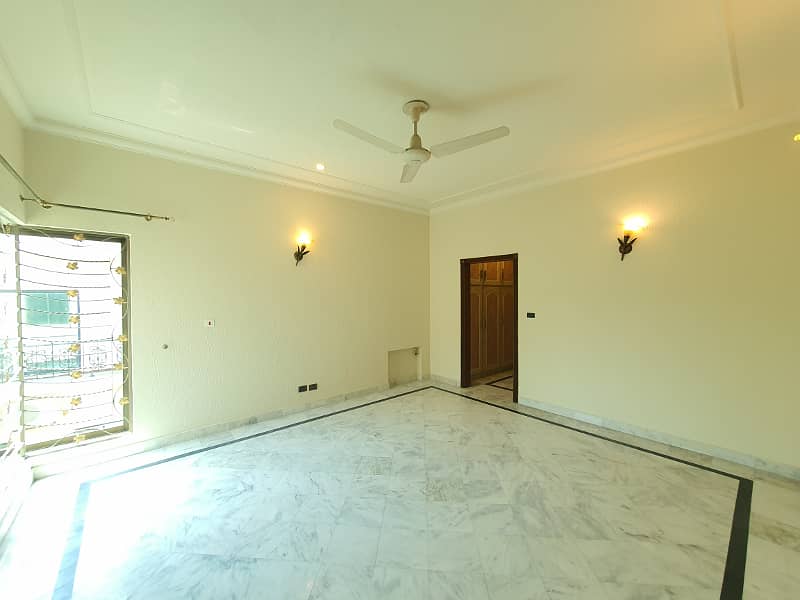 2 Kanal Fresh Renovated Well Maintained Independent Bungalow Lush Green Huge Lawn Near DHA Cinema 45