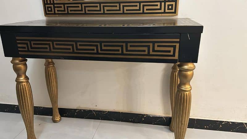 consol table black and golden 1