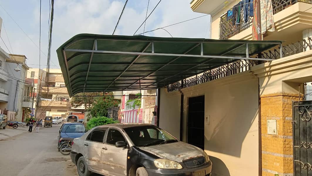car parking shade in karachi | car shed Fiber Shades - Tensile Shades 1