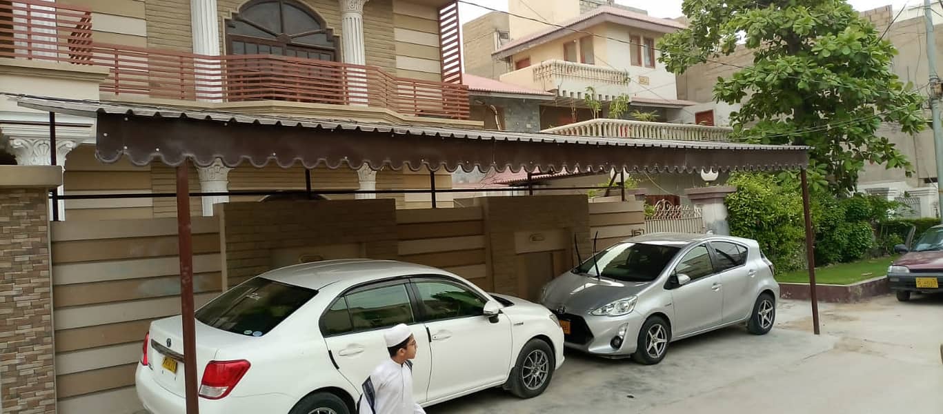 car parking shade in karachi | car shed Fiber Shades - Tensile Shades 3