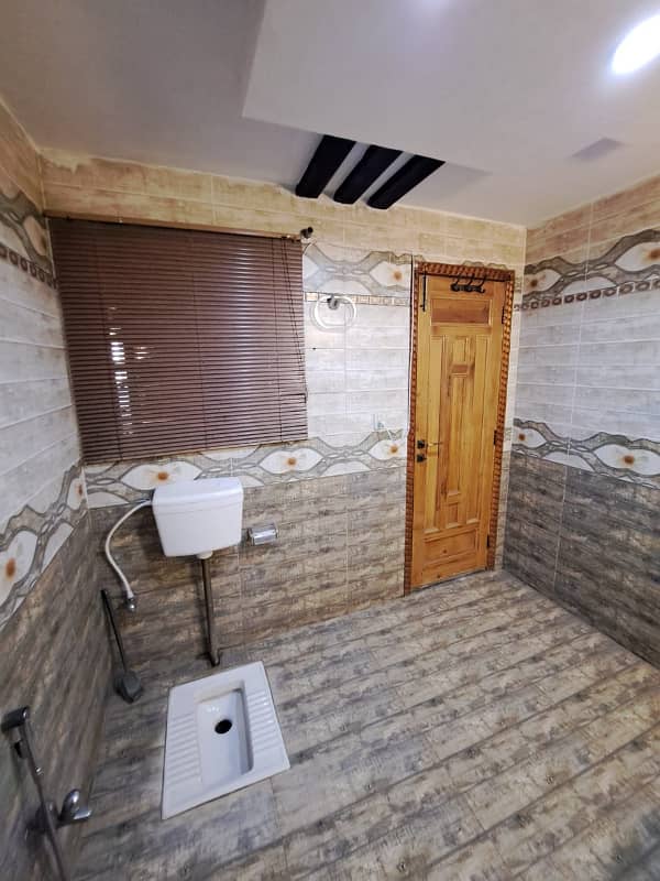 Luxurious 5-Bedroom House for Rent in Overseas B Block - PKR 120,000/Month 3