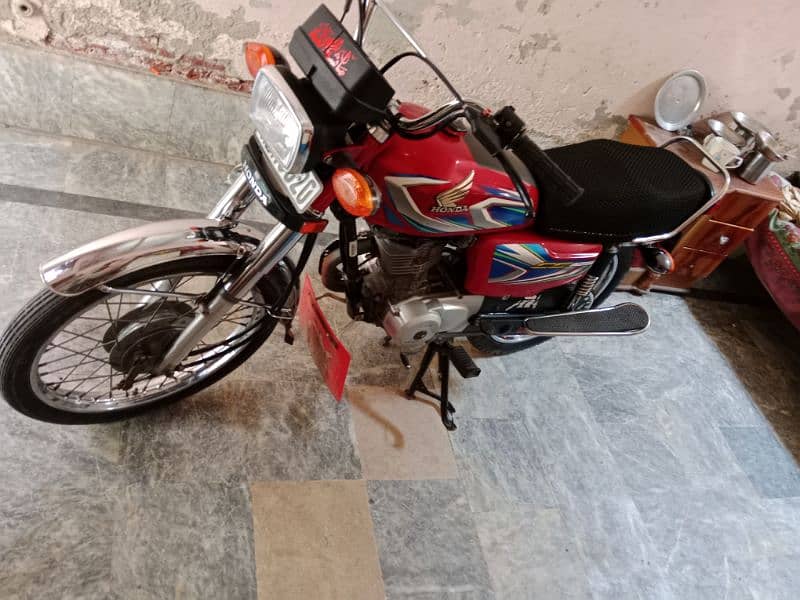 Honda cg 125 fit bike all Punjab ka number ha 15