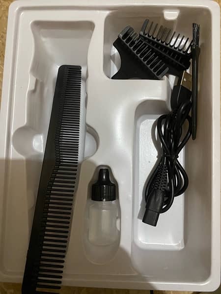 TRIMMER X FOR sale with all accessories only 1 day used 9