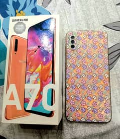 Samsung A70 (10/10 condition) with Free 5 back covers